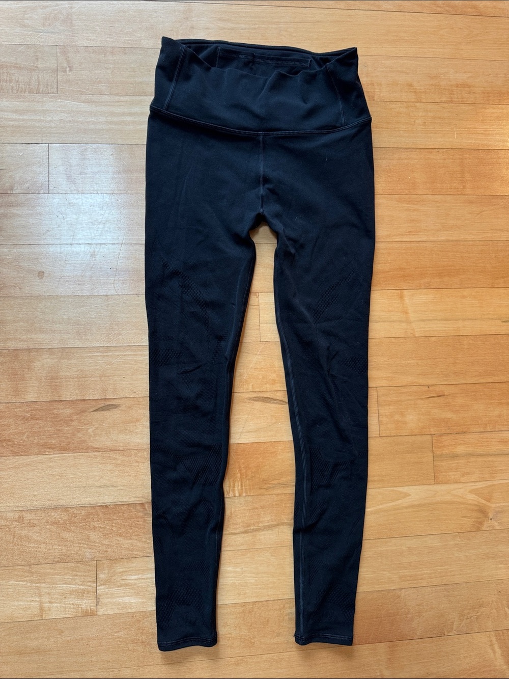 Lululemon black leggings with cute cut outs, like new size 8
